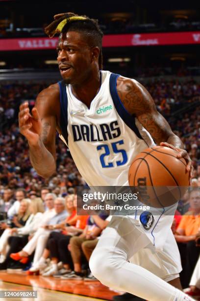 Reggie Bullock of the Dallas Mavericks drives to the basket Phoenix Suns during Game 7 of the 2022 NBA Playoffs Western Conference Semifinals on May...