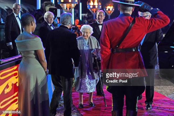 Queen Elizabeth II, with Prince Edward, Earl of Wessex, meets Alan Tichmarsh and Adjoa Andoh following the "A Gallop Through History" performance as...