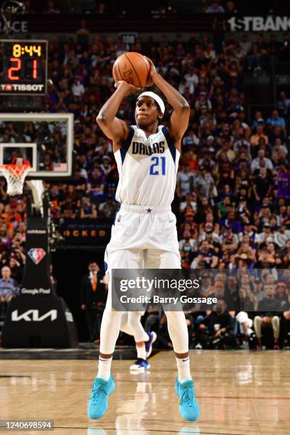 Frank Ntilikina of the Dallas Mavericks shoots a three point basket against the Phoenix Suns during Game 7 of the 2022 NBA Playoffs Western...