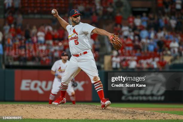 Albert Pujols of the St. Louis Cardinals pitches during the ninth inning against the San Francisco Giants at Busch Stadium on May 15, 2022 in St....