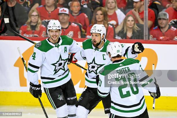 Dallas Stars Left Wing Jamie Benn celebrates with Dallas Stars Defenceman Miro Heiskanen and Dallas Stars Defenceman Ryan Suter after scoring a goal...