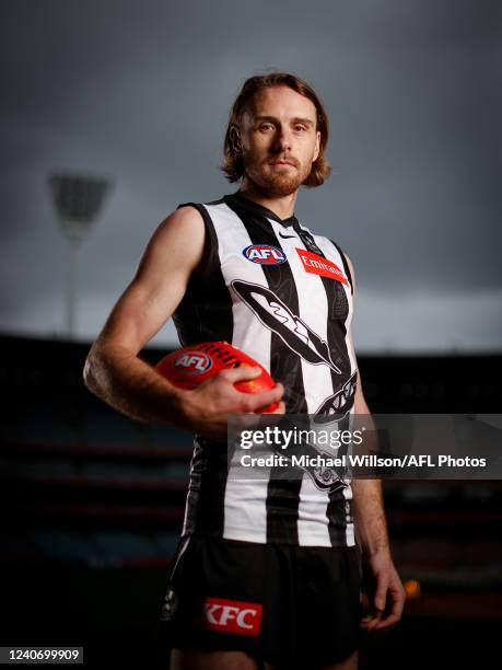 Jordan Roughead of the Magpies poses for a photograph in the teams Indigenous guernsey during the 2022 Sir Doug Nicholls Round Launch at the...