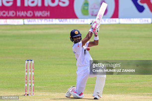 Sri Lanka's Dinesh Chandimal plays a shot during the second day of the first Test cricket match between Bangladesh and Sri Lanka at the Zahur Ahmed...