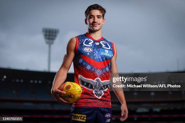 Toby Bedford of the Demons poses for a photograph in the teams Indigenous guernsey during the 2022 Sir Doug Nicholls Round Launch at the Melbourne...