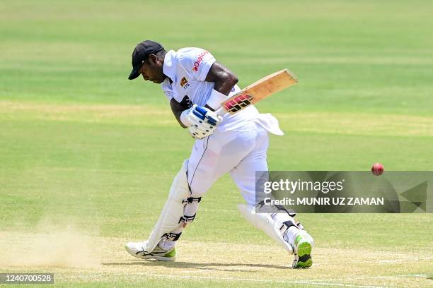 Sri Lanka's Angelo Mathews plays a shot during the second day of the first Test cricket match between Bangladesh and Sri Lanka at the Zahur Ahmed...