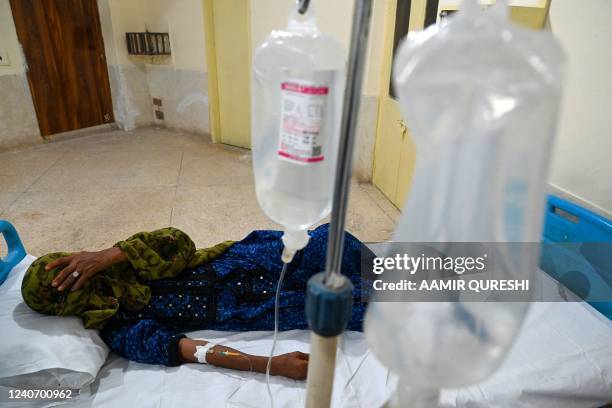 In this picture taken on May 11 a patient suffering from heat stroke is treated at a hospital in Jacobabad, in the southern Sindh province.