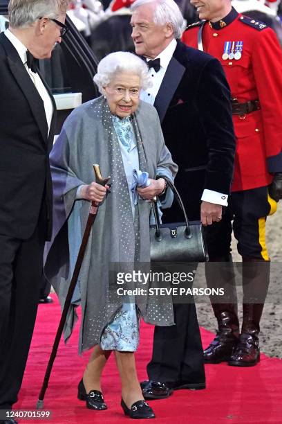 Britain's Queen Elizabeth II arrives for the "A Gallop Through History" Platinum Jubilee celebration at the Royal Windsor Horse Show at Windsor...