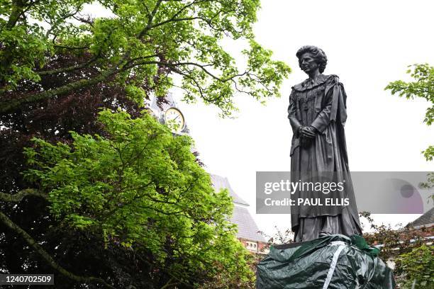 Photograph taken on May 16, 2022 shows the newly installed statue of late Britain's Prime Minister Margaret Thatcher, in her home town of Grantham,...