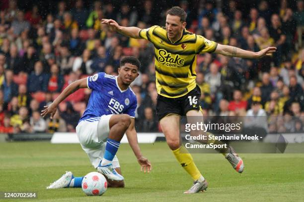 Watford's Dan Gosling is tackled by Leicester City's Wesley Fofana during the Premier League match between Watford and Leicester City at Vicarage...