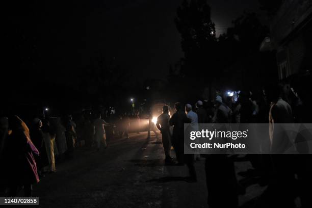 People make way for the ambulance carrying the dead body of a slain civilian Shoaib Ahmad Ganai who was killed after Indian forces allegedly shot him...