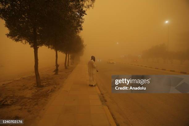 The streets are choked on yellow dust engulfing the city center as visibility in traffic degraded due to the sandstorm in Najaf, Iraq on May 15, 2022.