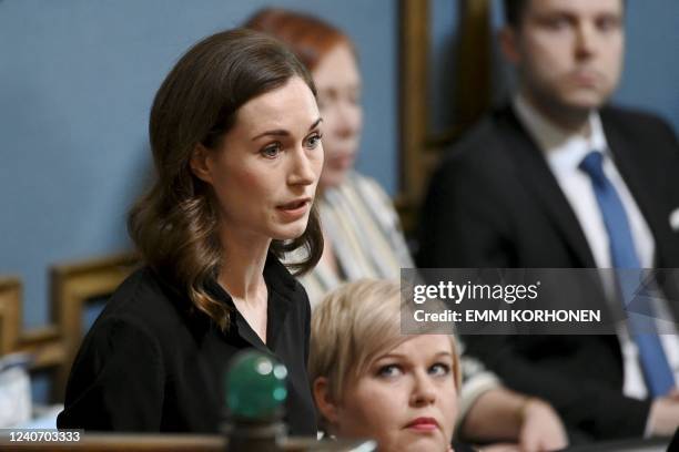 Finnish Prime Minister Sanna Marin speaks during a plenary session at the Finnish parliament in Helsinki, Finland, on May 16 as legislators debate...