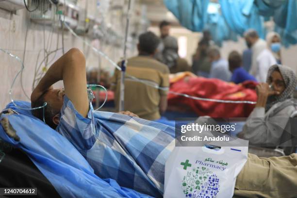 Man receives treatment in a hospital after being affected by the sandstorm in Baghdad, Iraq on May 16, 2022.