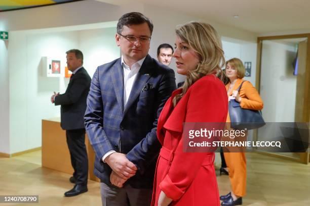 Ukraine's Foreign Minister Dmytro Kuleba and Canadian Foreign Minister Melanie Joly arrive ahead the second part of a meeting of the Foreign Affairs...