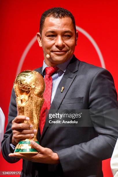 Former Brazilian football player Gilberto Silva holds the World Cup Trophy within the 2022 FIFA World Cup Trophy Tour at Sheikh Jaber Al Ahmed...