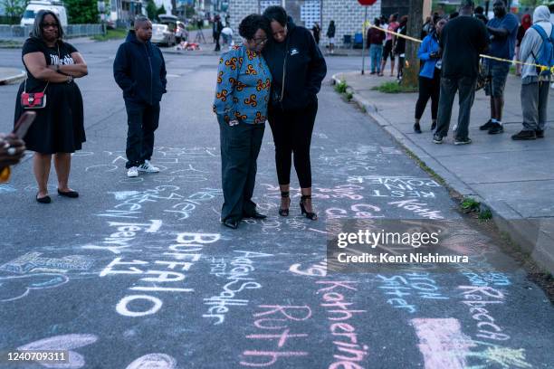 Majority Leader of the New York State Assembly, Crystal Peoples-Stokes, center left, shares a moment with Marnetta Malcom as they visit a makeshift...