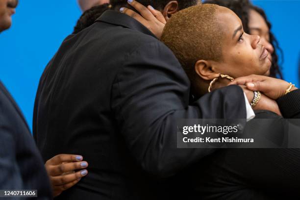 Tiffany Whitfield is supported by Garnell Whitfield Jr., during a news conference with Attorney Ben Crump and members of the family of the late Ruth...
