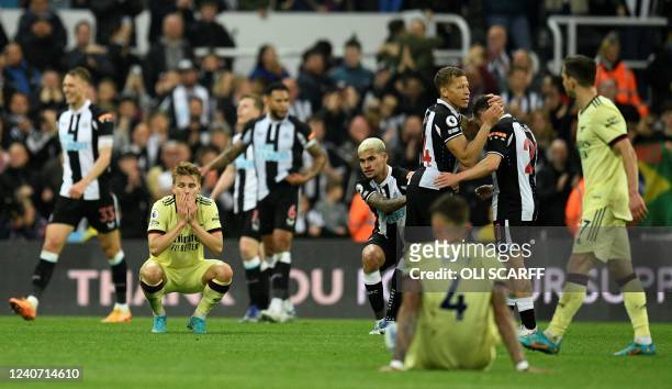 Arsenal's Norwegian midfielder Martin Odegaard reacts after the English Premier League football match between Newcastle United and Arsenal at St...