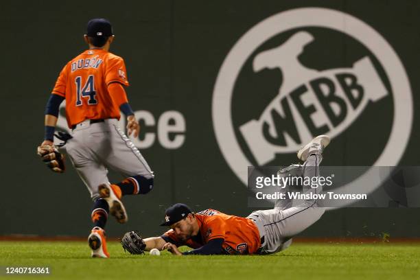 Chas McCormick of the Houston Astros is unable to make the play off a RBI hit by Alex Verdugo of the Boston Red Sox during the fourth inning at...