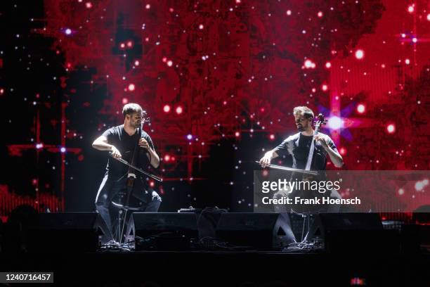 Stjepan Hauser and Luka Sulic of the Croatian-Slovenian cellist duo 2Cellos perform live on stage during a concert at the Mercedes-Benz Arena on May...