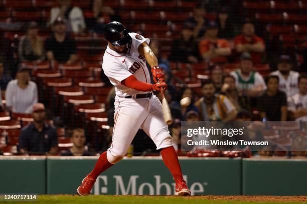 Xander Bogaerts of the Boston Red Sox connects on a two-run home run against the Houston Astros during the eighth inning at Fenway Park on May 16,...