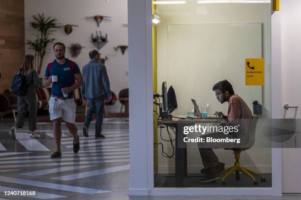 Workers inside Google's new Bay View campus in Mountain View, California, US, on Monday, May 16, 2022. On Monday Google opened its newest campus near...