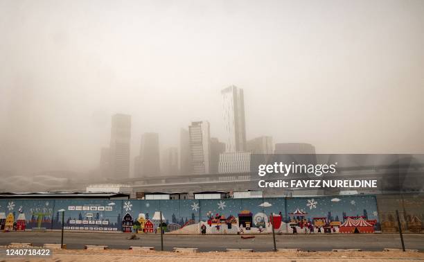 This picture taken on May 17, 2022 shows a view of the monorail station and skyline of the King Abdullah Financial District in the Aqeeq area of...