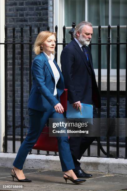 Liz Truss, UK foreign secretary, left, and Tim Barrow, political director at the UK foreign office, arrive for a cabinet meeting at number 10 Downing...