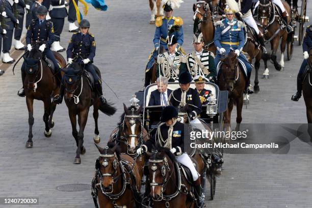 King Carl XVI Gustaf of Sweden and Finish president Sauli Niinisto arrive at Stockholm Palace by horse and carriage on May 17, 2022 in Stockholm,...