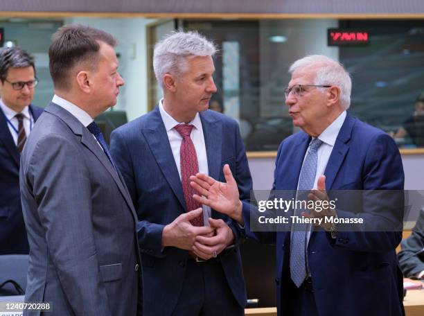 Polish Minister of National Defence Mariusz Blaszczak talks with the Minister for Defence of Latvia Artis Pabriks and the EU Commissioner for Foreign...