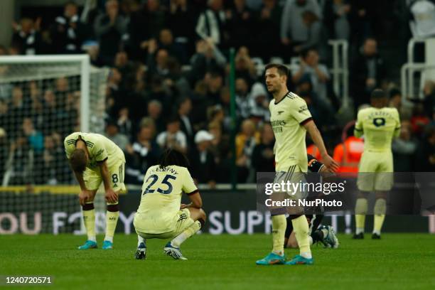 Arsenal players appear dejected after the Premier League match between Newcastle United and Arsenal at St. James's Park, Newcastle on Monday 16th May...