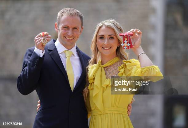 Dame Laura Kenny poses after she received her Dame Commander medal and Sir Jason Kenny poses after he received his Knight Bachelor medal awarded by...