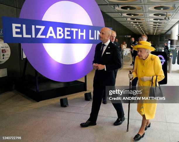Britain's Queen Elizabeth II visits Paddington Station in London on May 17 to mark the completion of London's Crossrail project, ahead of the opening...