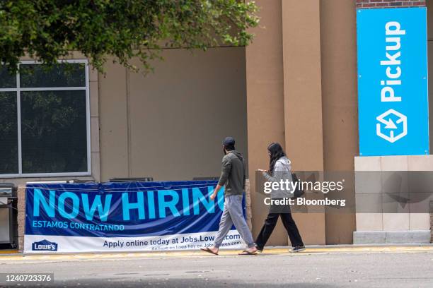 Now Hiring" sign outside a Lowe's store in Dublin California, US, on Wednesday, May 11, 2022. Lowe's Cos Inc. Is scheduled to release earnings...