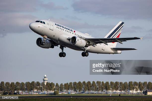 Air France Airbus A318 aircraft as seen during take off and flying phase from Amsterdam Schiphol Airport. The narrow body A318 is departing from...