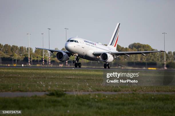 Air France Airbus A318 aircraft as seen during take off and flying phase from Amsterdam Schiphol Airport. The narrow body A318 is departing from...