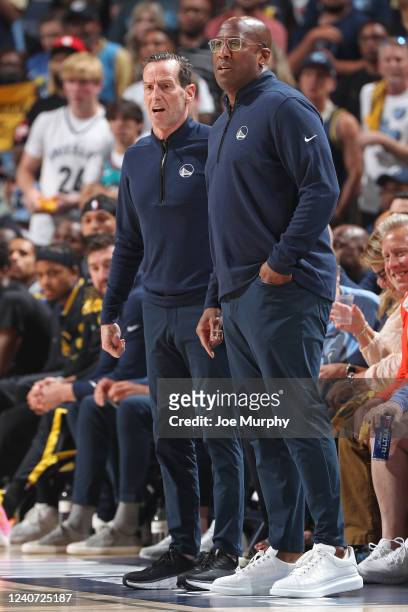 Assistant Coaches Kenny Atkinson and Mike Brown of the Golden State Warriors looks on during the game against the Memphis Grizzlies during Game 5 of...