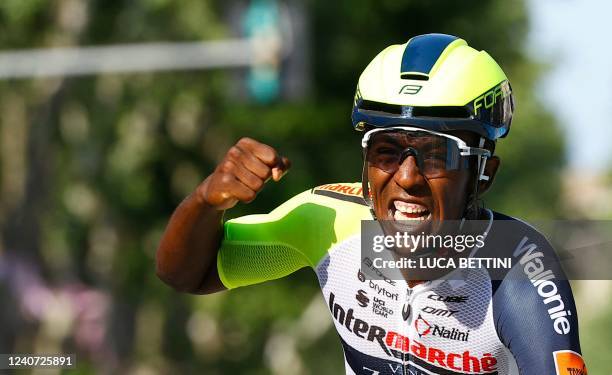 Team Wanty's Eritrean rider Biniam Girmay Hailu celebrates as he crosses the finish line to win the 10th stage of the Giro d'Italia 2022 cycling...