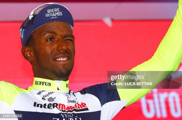 Team Wanty's Eritrean rider Biniam Girmay Hailu celebrates on the podium after winning the 10th stage of the Giro d'Italia 2022 cycling race, 196...