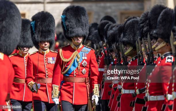 The Prince William, The Duke of Cambridge, Colonel of the Irish Guards, inspects the 1st battalion in the Quadrangle of Windsor Castle before...