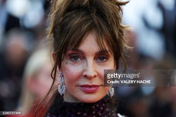 French actress Anne Parillaud arrives to attend the screening of "Final Cut " ahead of the opening ceremony of the 75th edition of the Cannes Film...