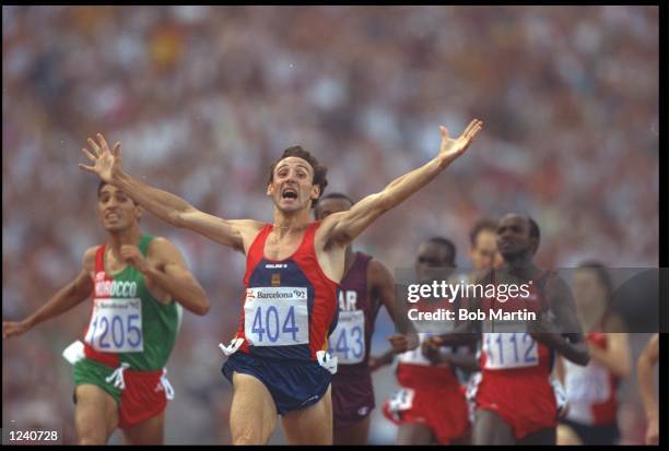 FERMIN CACHO RUIZ OF SPAIN THROWS HIS ARMS IN THE AIR AS HE CLAIMS VICTORY IN THE MENS 1500 METRE FINAL. RUIZ SURPRISED EVERYONE BY WINNING IN A TIME...