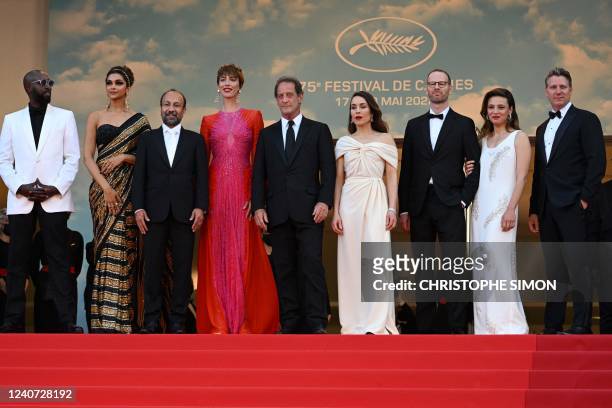 French actor and President of the Jury of the 75th Cannes Film Festival Vincent Lindon poses with jury members French director Ladj Ly, Indian...