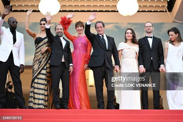 French actor and President of the Jury of the 75th Cannes Film Festival Vincent Lindon pose with jury members French director Ladj Ly, Indian actress...