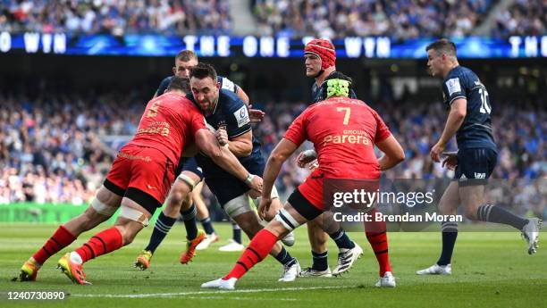 Dublin , Ireland - 14 May 2022; Jack Conan of Leinster is tackled by Rynhardt Elstadt of Toulouse during the Heineken Champions Cup Semi-Final match...