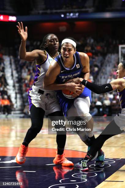 Brionna Jones of the Connecticut Sun drives to the basket during the game against the Los Angeles Sparks on May 14, 2022 at the Mohegan Sun Arena in...