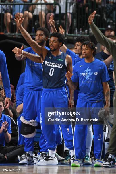 The Dallas Mavericks celebrate during Game 6 of the 2022 NBA Playoffs Western Conference Semifinals on May 12, 2022 at the American Airlines Center...