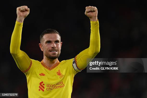 Liverpool's English midfielder Jordan Henderson celebrates at the end of the English Premier League football match between Southampton and Liverpool...