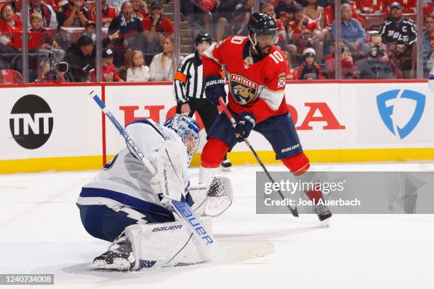 Anthony Duclair of the Florida Panthers waits for a tip-in attempt in front of goaltender Andrei Vasilevskiy of the Tampa Bay Lightning during first...