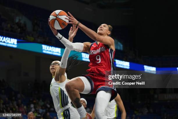 Natasha Cloud of the Washington Mystics shoots the ball against the Dallas Wings on May 17, 2022 at College Park Center in Arlington, TX. NOTE TO...